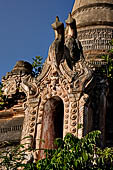 Inle Lake Myanmar. Indein, a cluster of ancient stupas  ruined and overgrown with bushes, just behind the village.